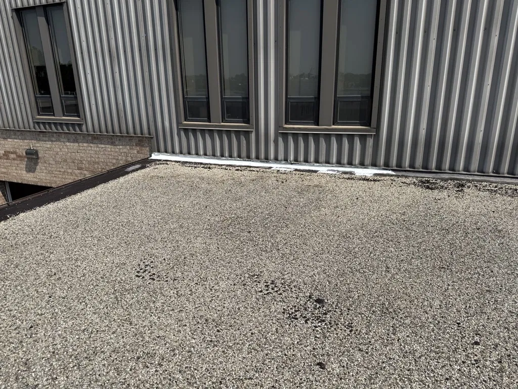 Commercial roof patch around rooftop equipment